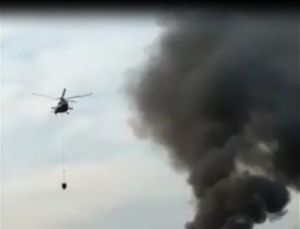 Вертолет Ми-8 подключили к тушению лесного пожара возле воронежского хутора (Вести Воронеж)